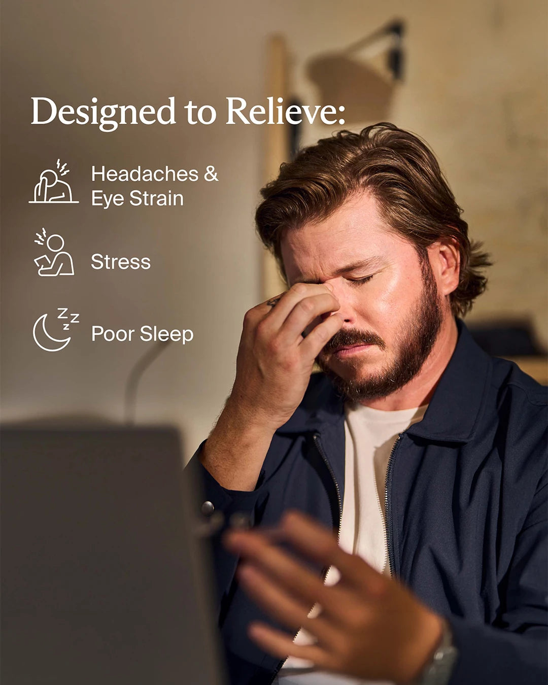 Man with headache or eye strain, sitting in front of a laptop, with text 'Designed to Relieve: Headaches & Eye Strain, Stress, Poor Sleep'.