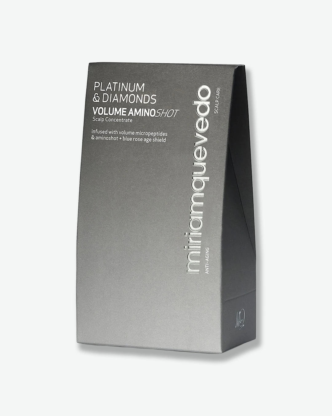 Black box packaging of 'Platinum & Diamonds Volume Amino Shot' by MIRIRAM QUEVEDO on a white background