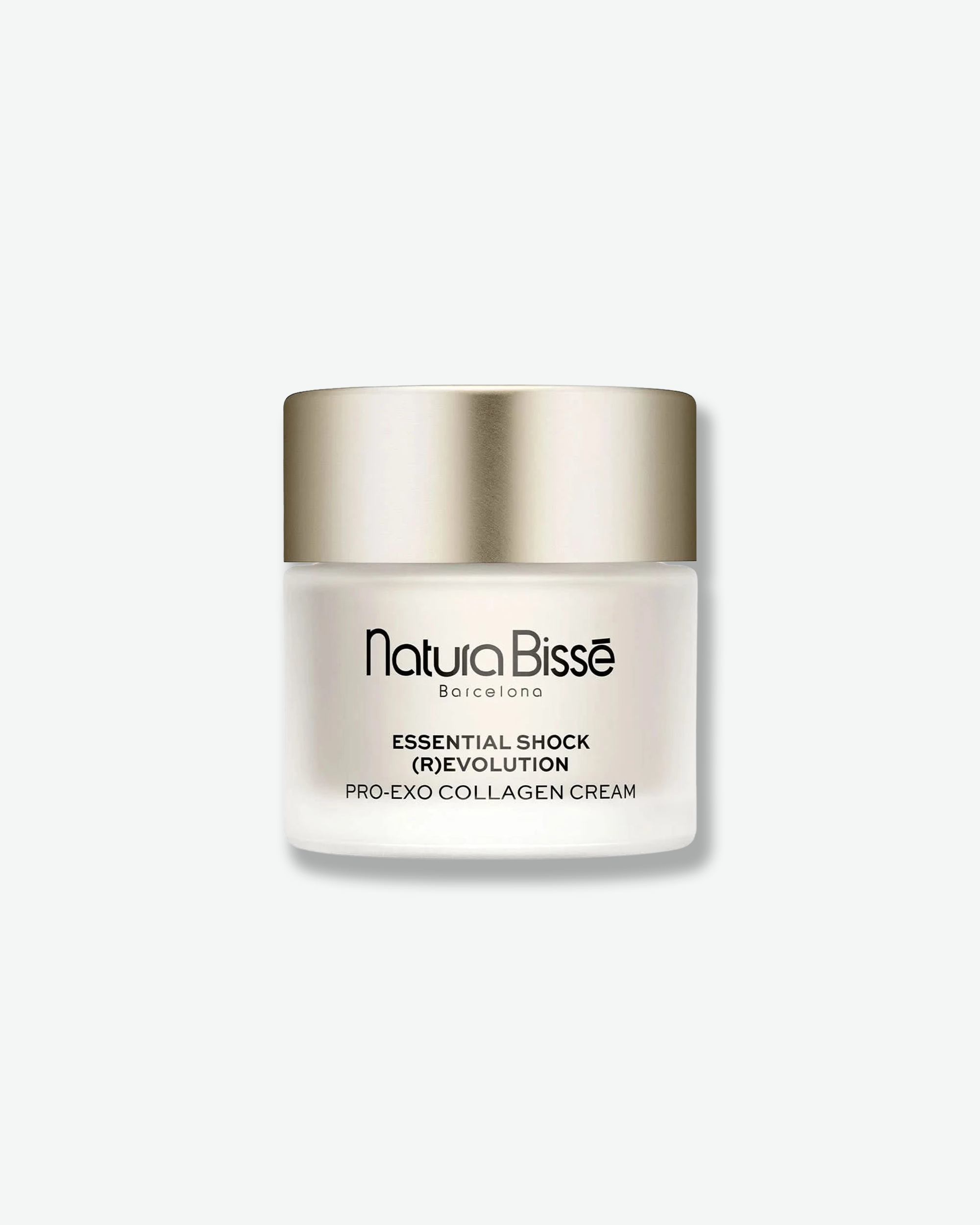 Front view of a Natura Bissé Essential Shock (R)evolution Pro-Exo Collagen Cream jar against a plain gray background. The vessel features a frosted white, translucent glass body printed with black branding, topped with a smooth, satin champagne-gold metallic lid.