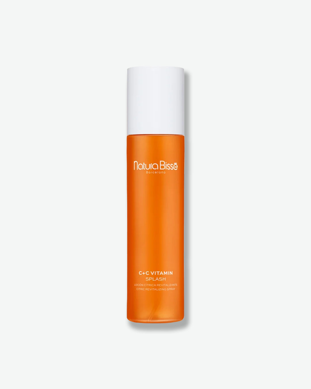 Orange bottle with white cap on a light gray background