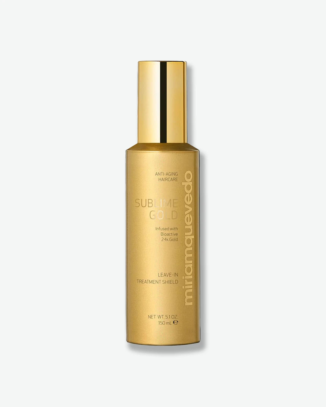 Gold bottle of Miriam Quevedo Sublime Gold Leave-In Treatment on a white background