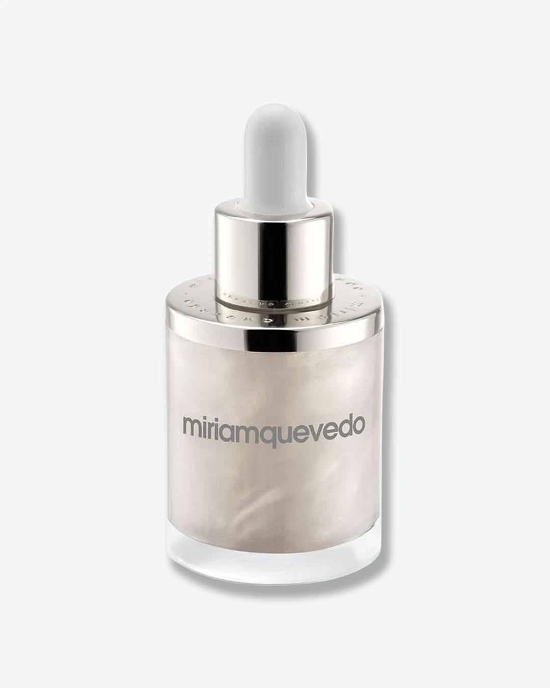 Hair serum bottle with dropper labeled 'miriam quevedo' on a white background