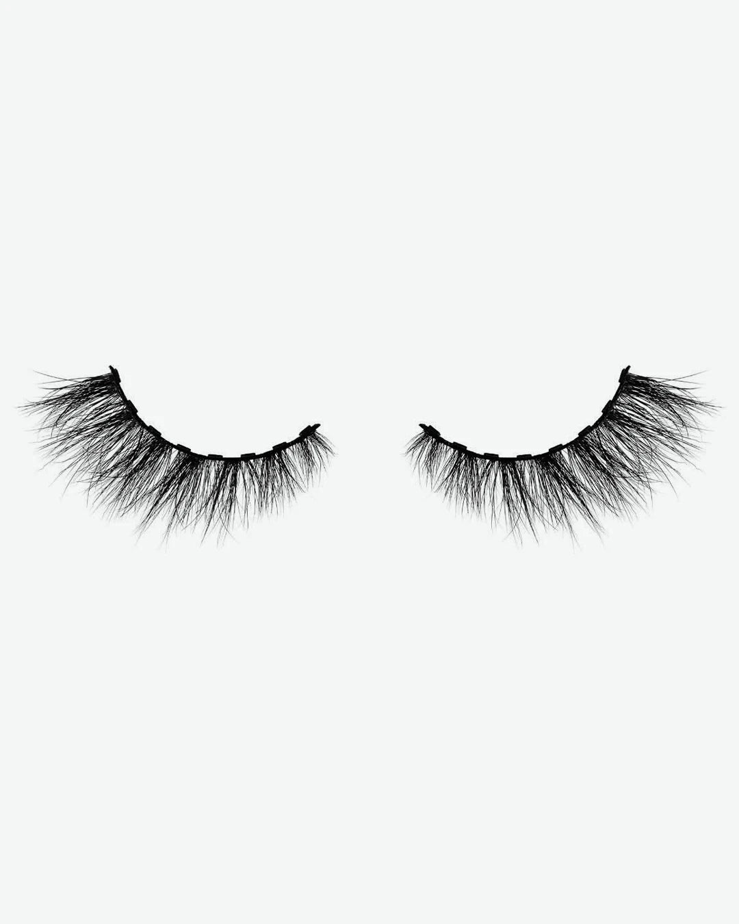 Pair of false eyelashes on a white background