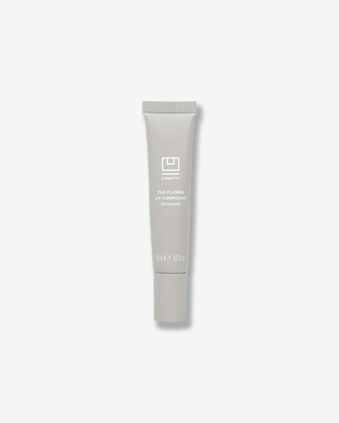Lip compound tube with brand logo on a light gray background