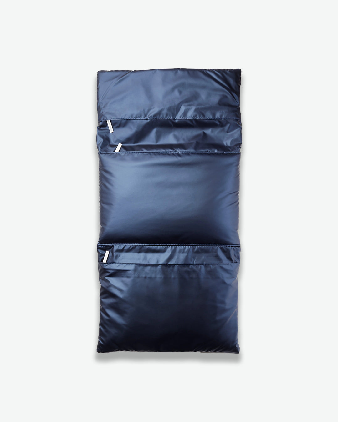 Navy blue sleeping bag on a light gray background