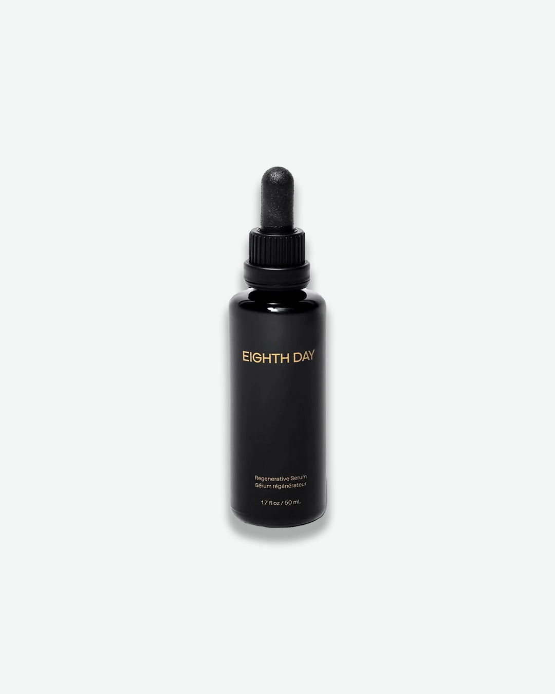 Black bottle with dropper labeled 'Eighth Day' on a white background
