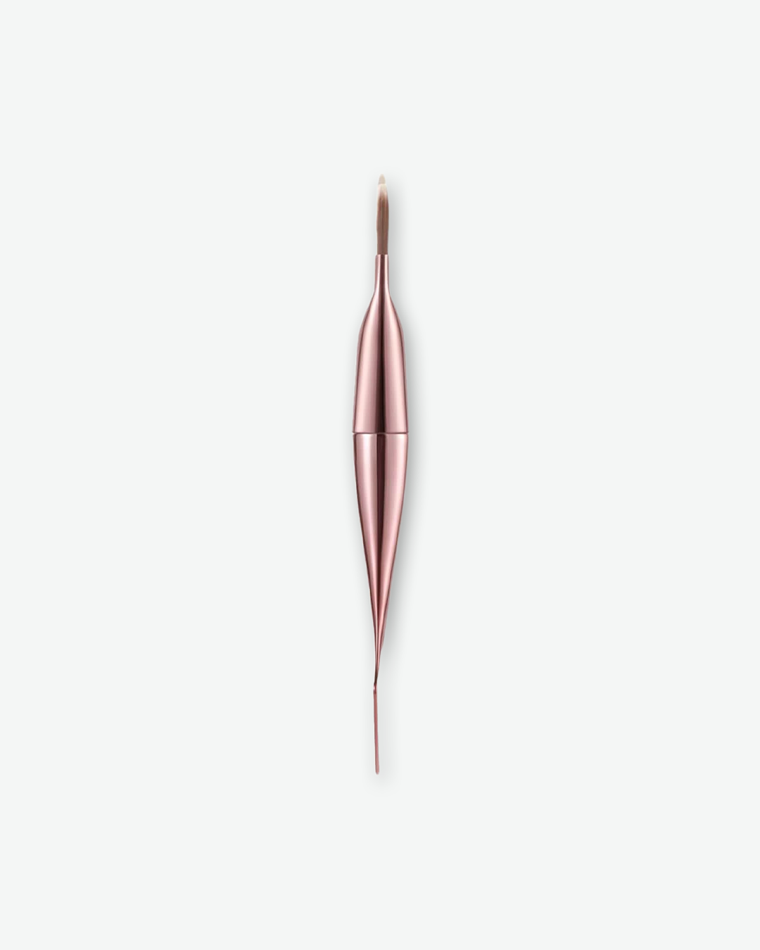 A luxury metallic rose gold skincare applicator tool featuring a dual-ended design with a fine brush tip on one end and a slender spatulate tip on the other, isolated against a light grey background.