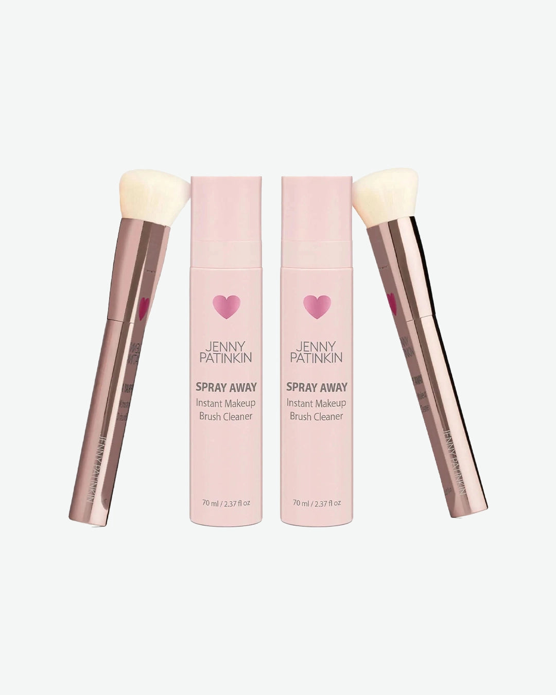 Two bottles of Jenny Patinkin Spray Away Instant Makeup Brush Cleaner with two brushes on a light gray background.