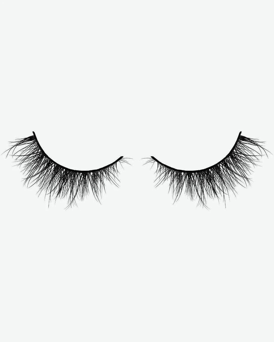 Pair of false eyelashes on a white background