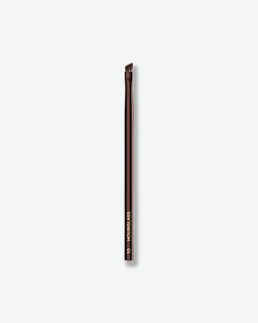 Eyebrow brush with a brand name on a white background