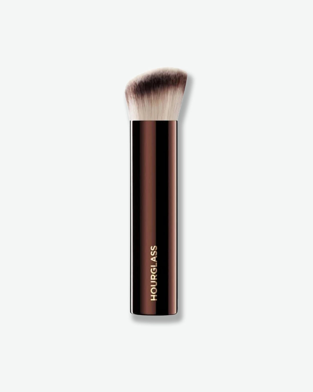 Hourglass makeup brush on a white background