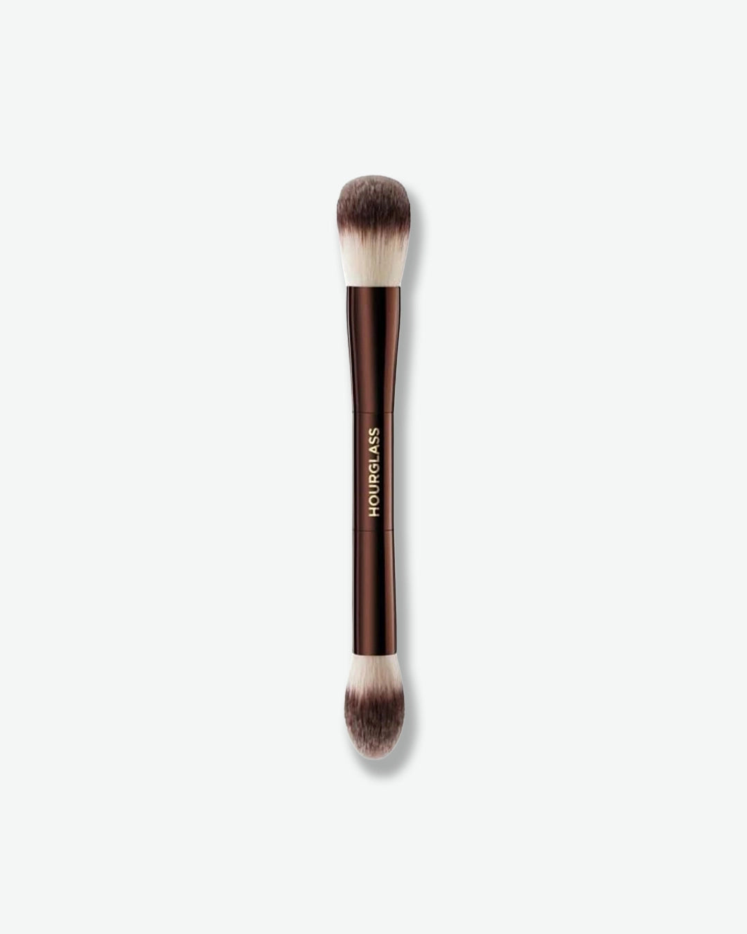Makeup brush with 'Hourglass' branding on a white background