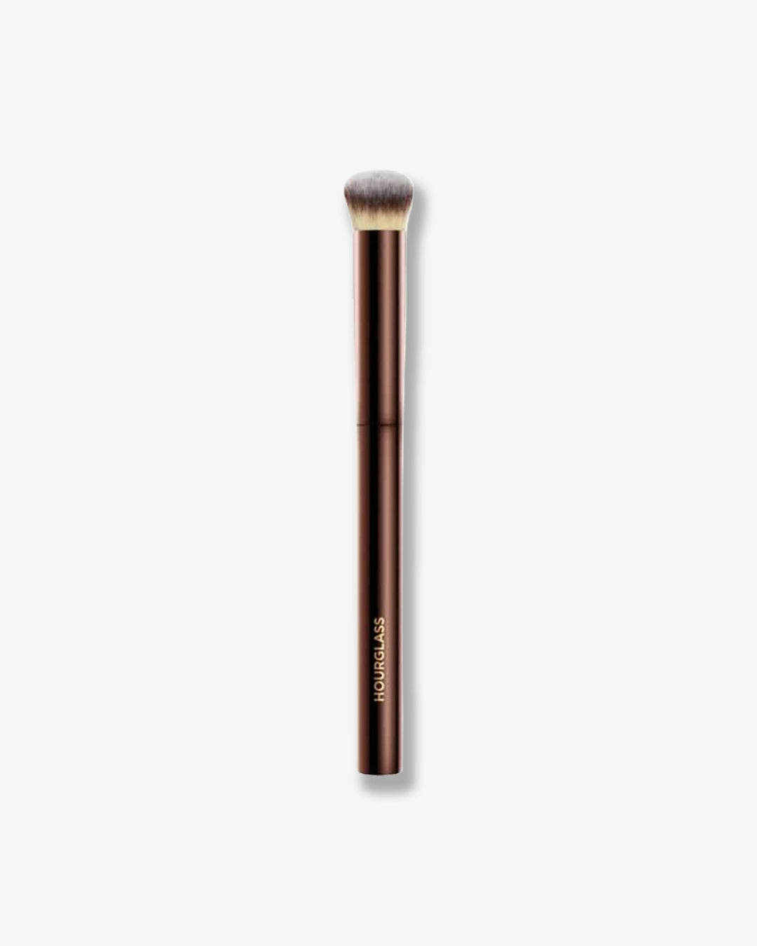 Makeup brush with brown handle and black bristle head on a white background
