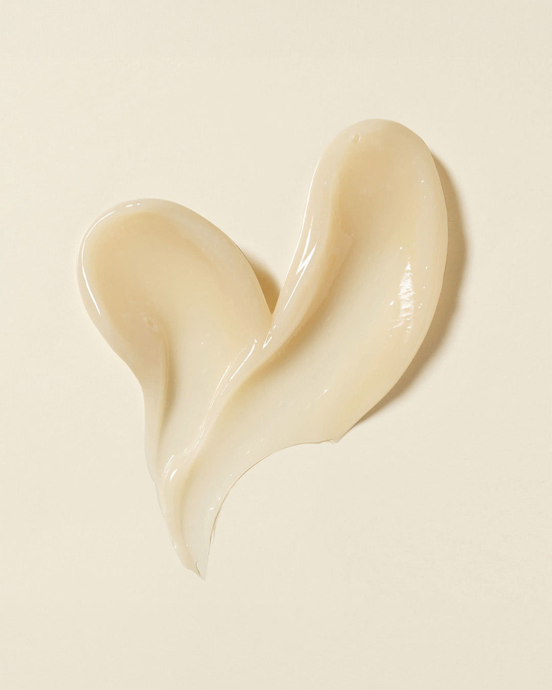 Beige colored product texture swatch on a beige background