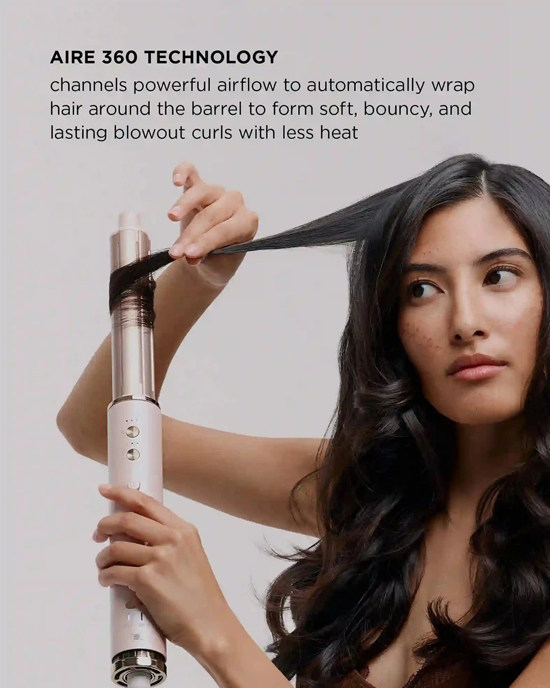 Woman using a hair styling tool with text about AIRE 360 Technology