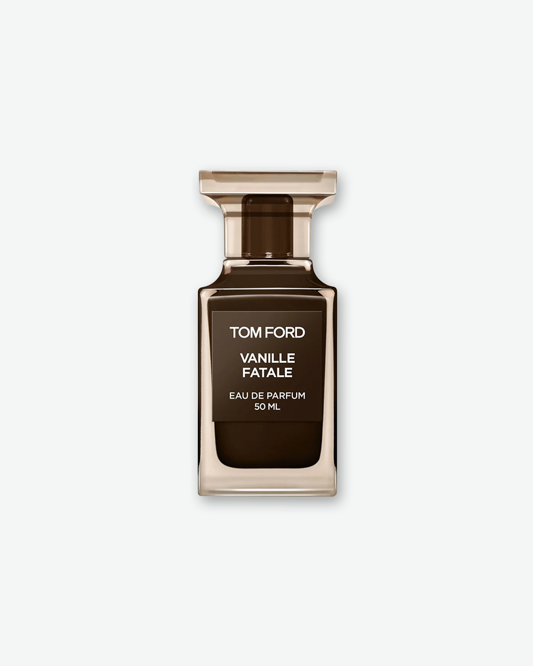 Product shot of Tom Ford Vanille Fatale Eau de Parfum. The 50ml clear, architectural glass bottle showcases a very dark, mahogany-brown liquid inside. It features a square matte dark brown label with crisp white text and a matching translucent dark cap, casting a soft shadow against a solid light grey background.