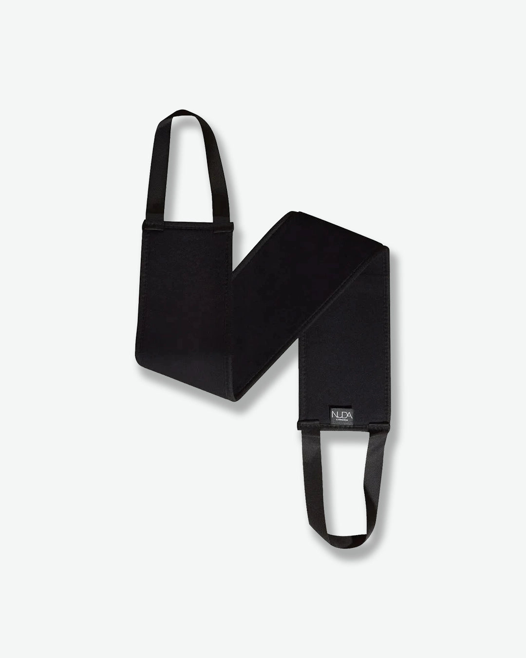 Black rectangular tan back applicator with a handle on a white background