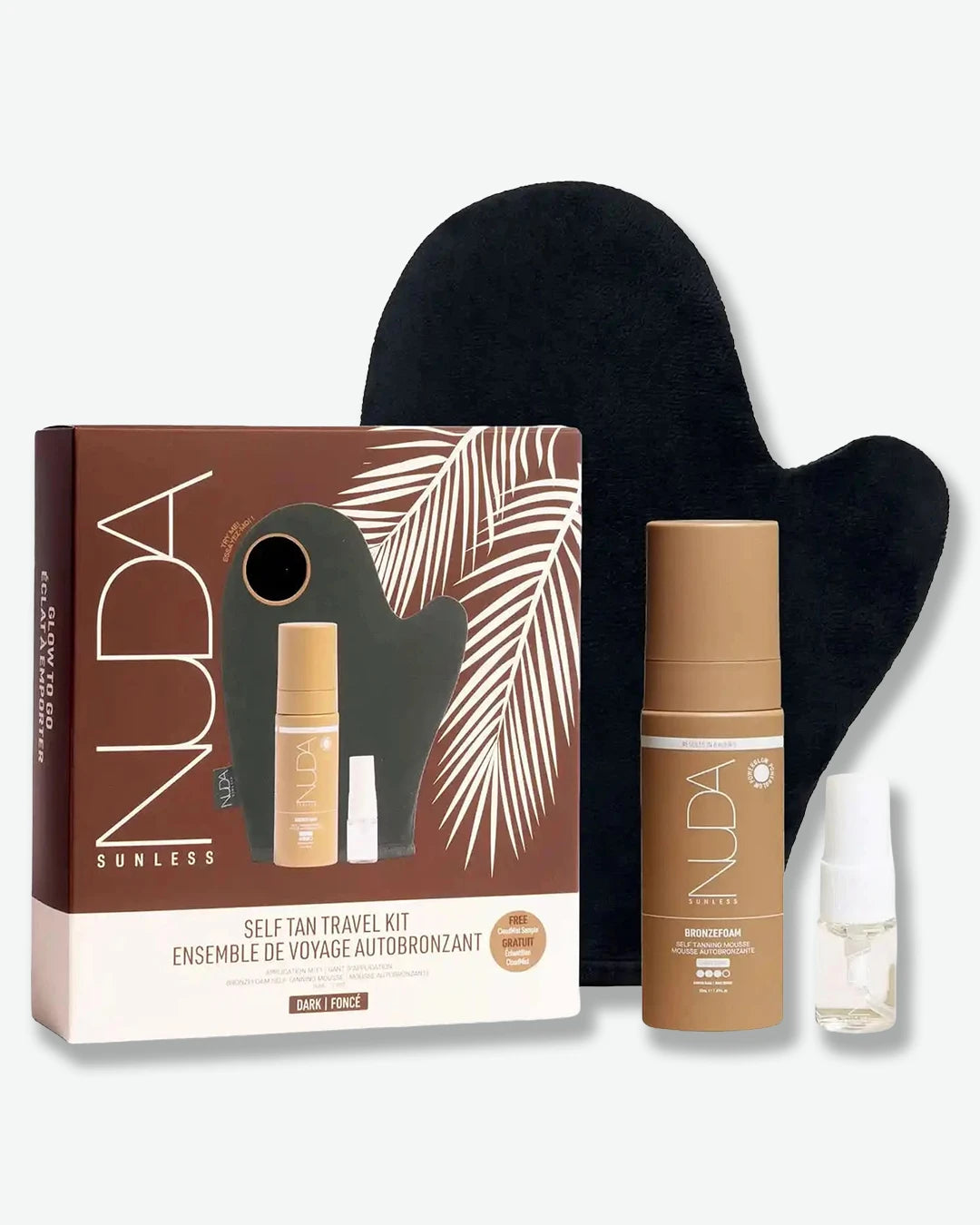NUDA self-tan travel kit with packaging, mitt, and bottles on a white background