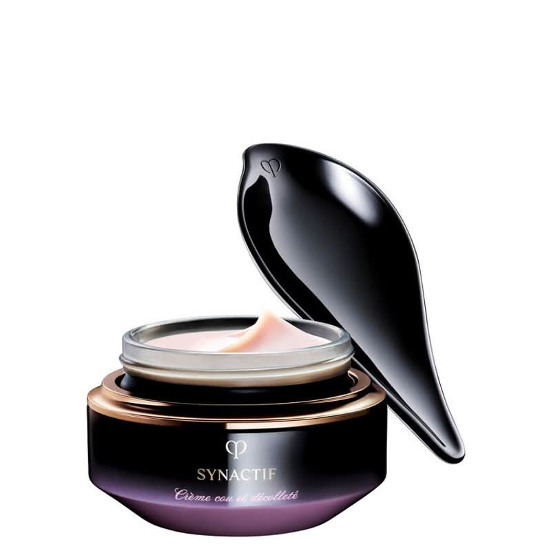 Cosmetic jar with a black spoon on a white background, featuring the brand 'SYNACTIF'.