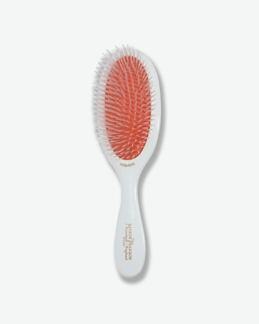 Top-down view of a Mason Pearson wide-tooth dressing comb featuring a polished tortoiseshell acrylic design with gold branding text reading "Mason Pearson London England".