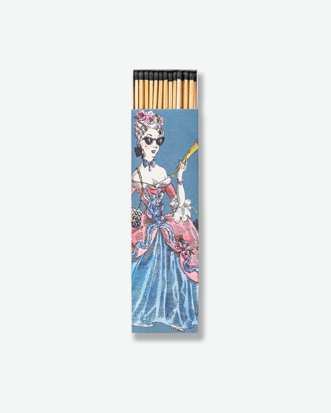 Matches with a decorative packaging featuring a woman in a blue dress on a white background