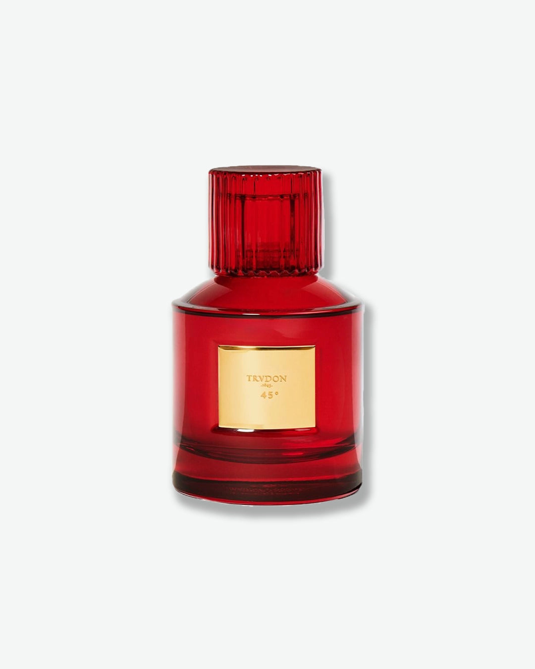 Red perfume bottle with gold label on a white background
