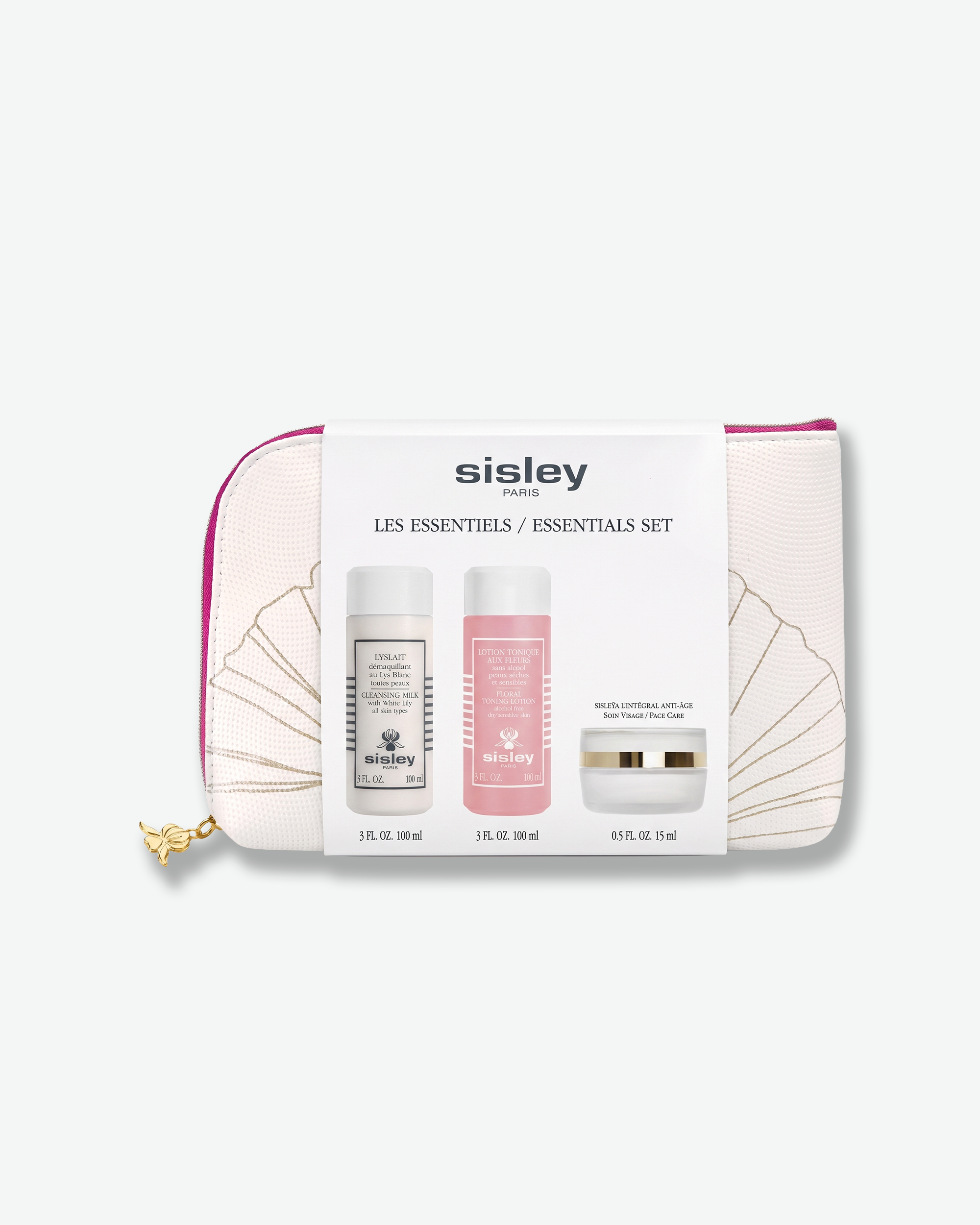 A Sisley Paris Essentials Set featuring a white zippered cosmetic pouch with gold fan artwork and a magenta zipper, wrapped in a branded paper band illustrating the included skincare items.