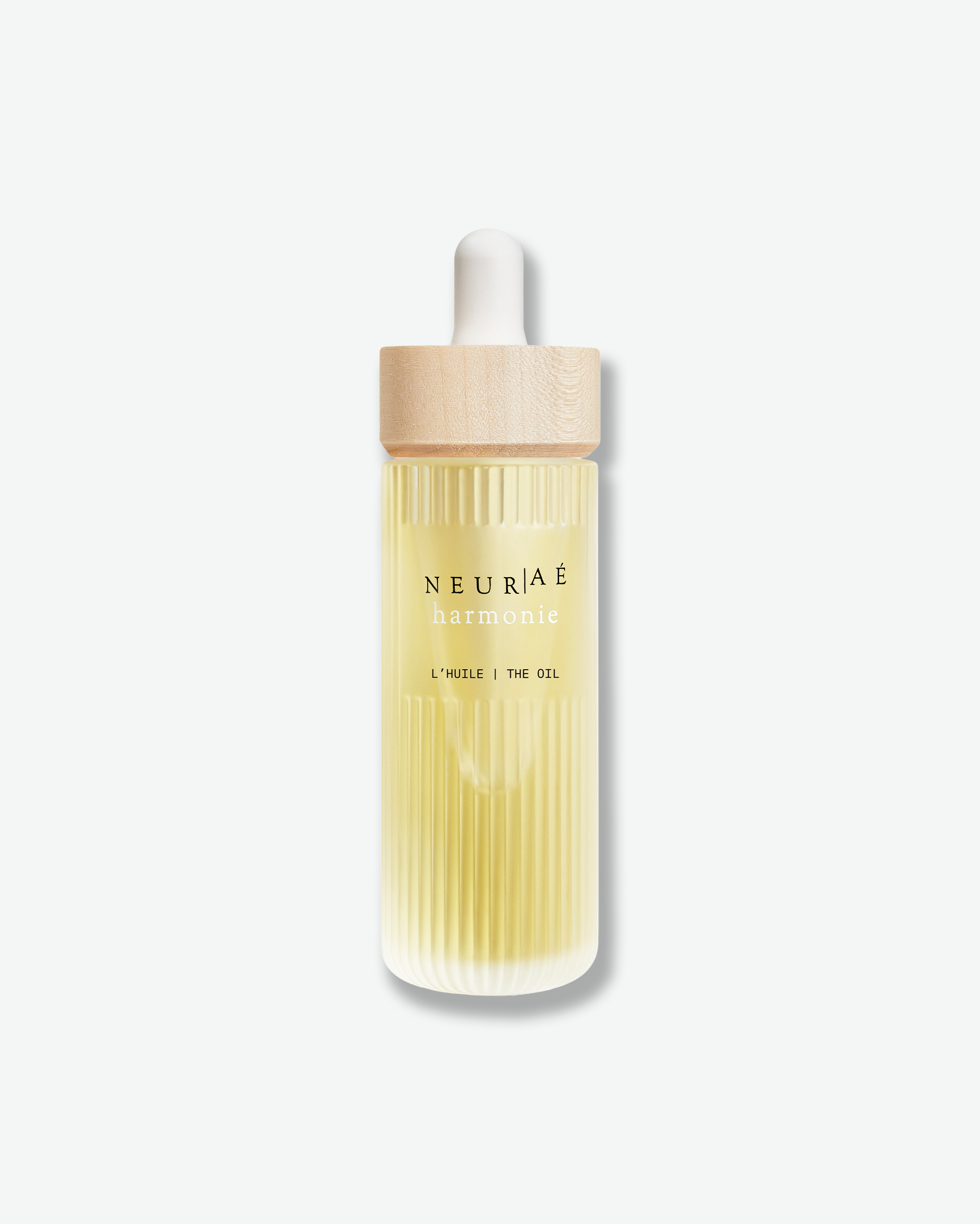 Neurae skincare bottle with wooden cap on a white background