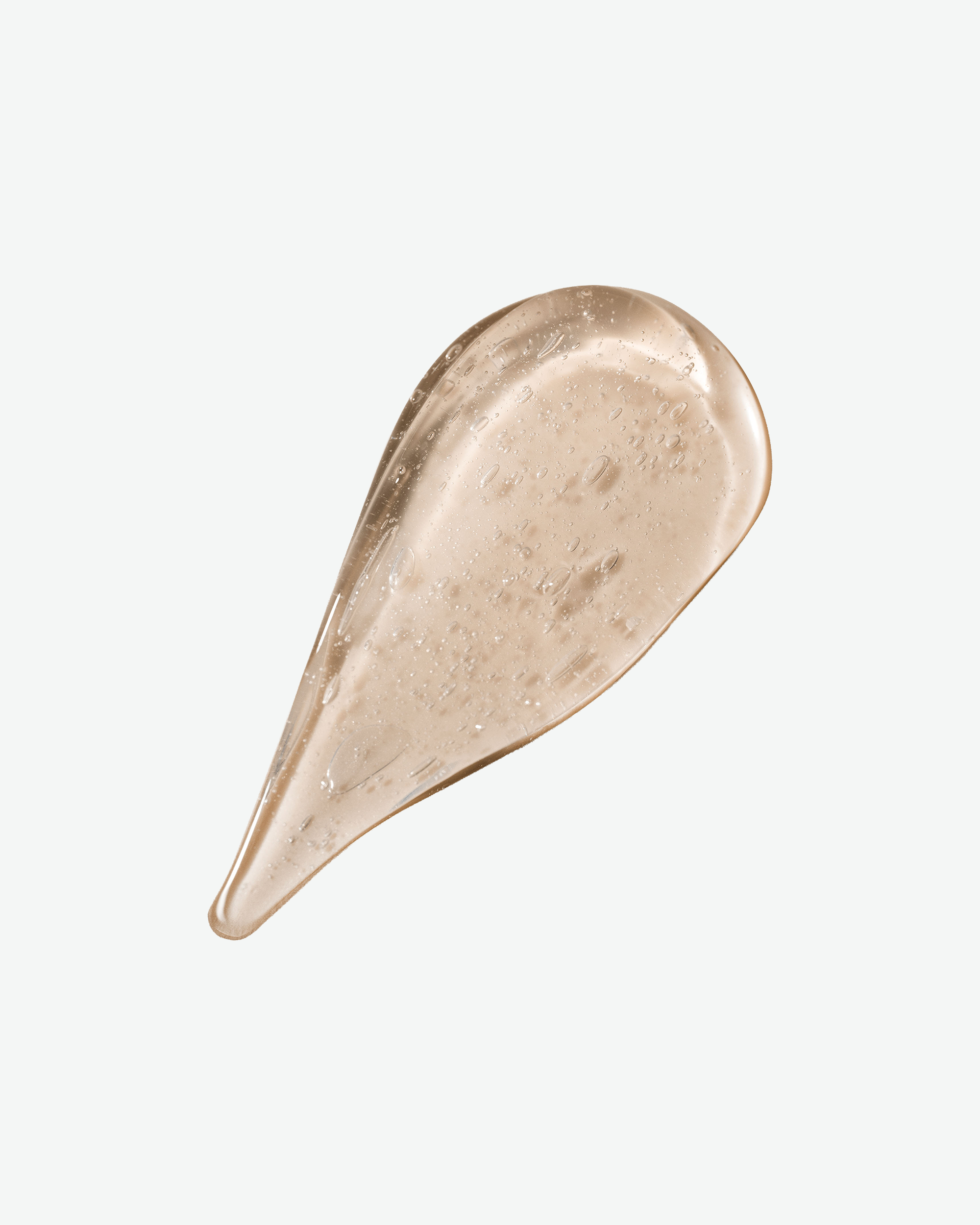 A translucent gel skincare product texture smear isolated on a solid white background.