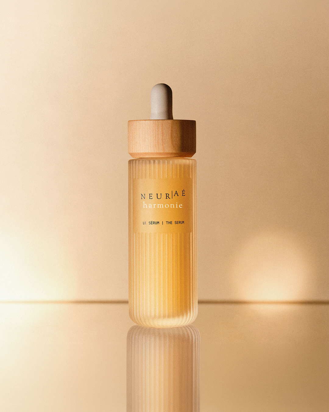 Neurae serum bottle on a beige background