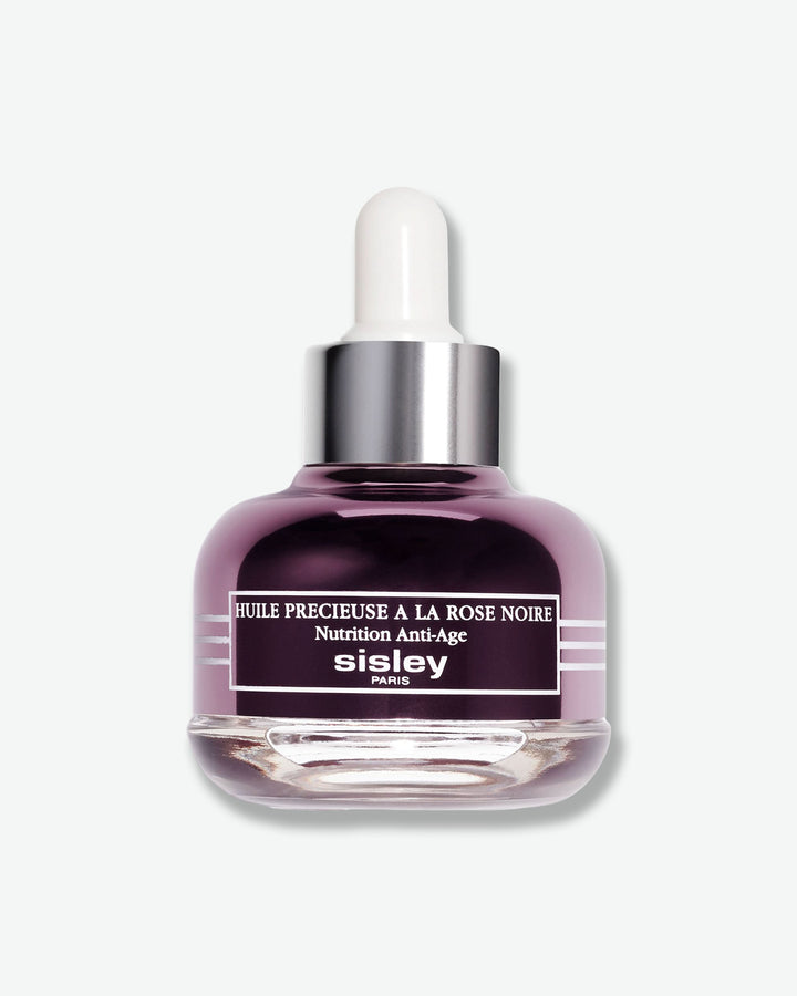 Sisley skincare dropper bottle on a white background