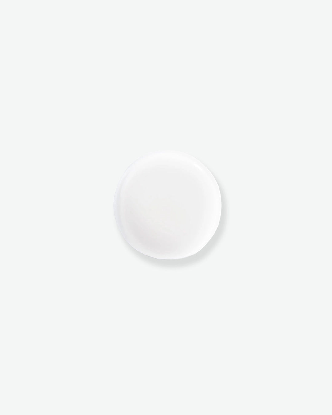 White circular object on a white background