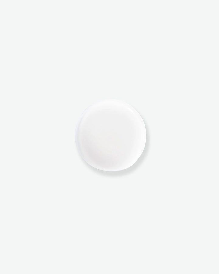 White circular object on a white background