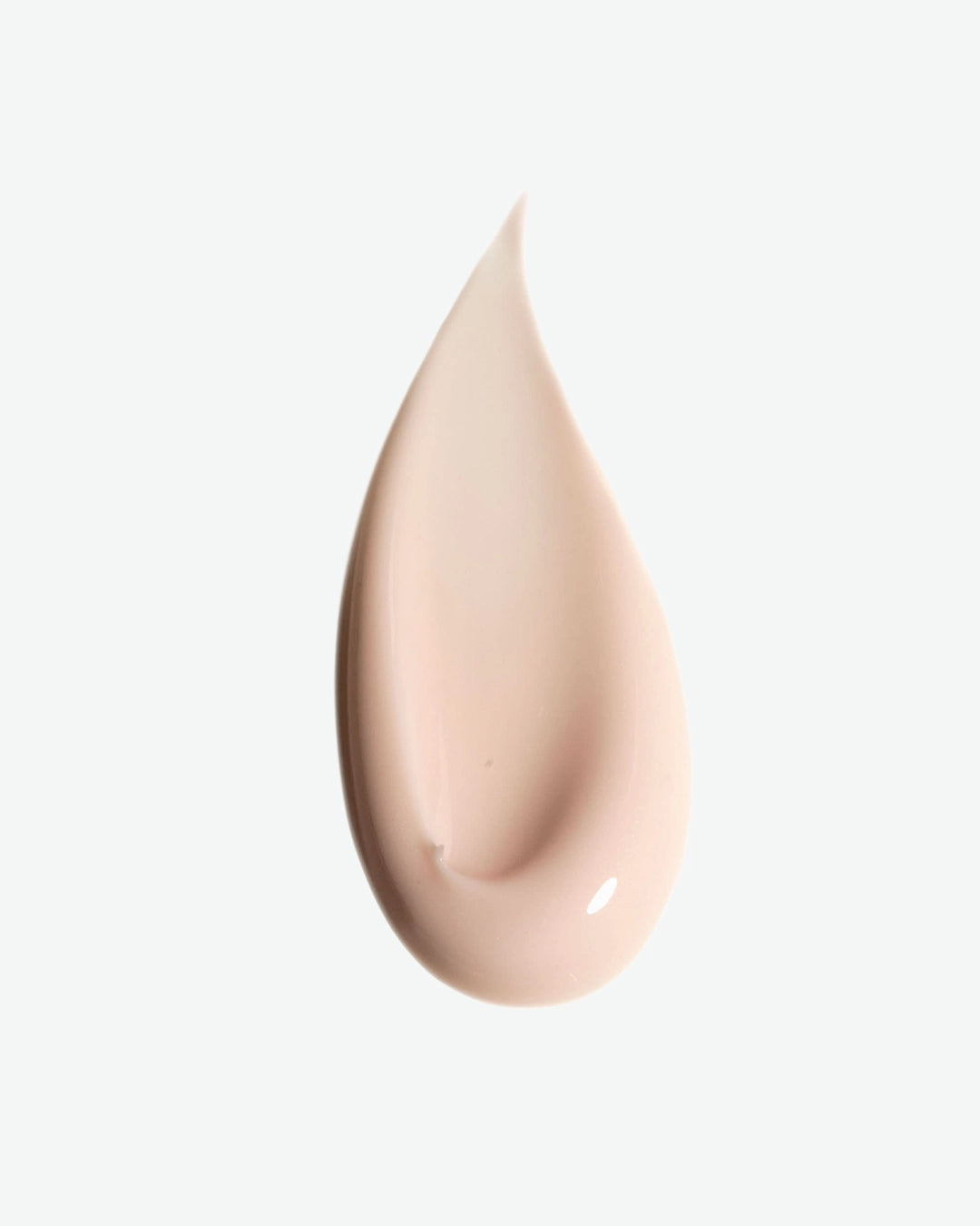 Beige droplet on a light gray background