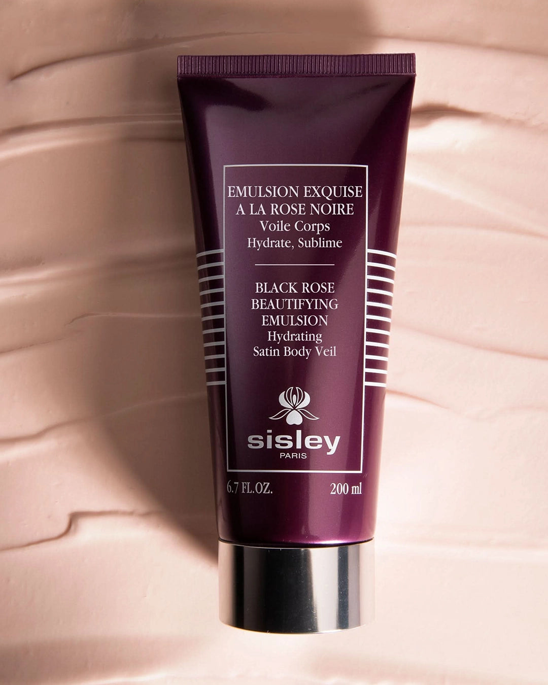 Sisley Black Rose Beautifying Emulsion tube on a beige background