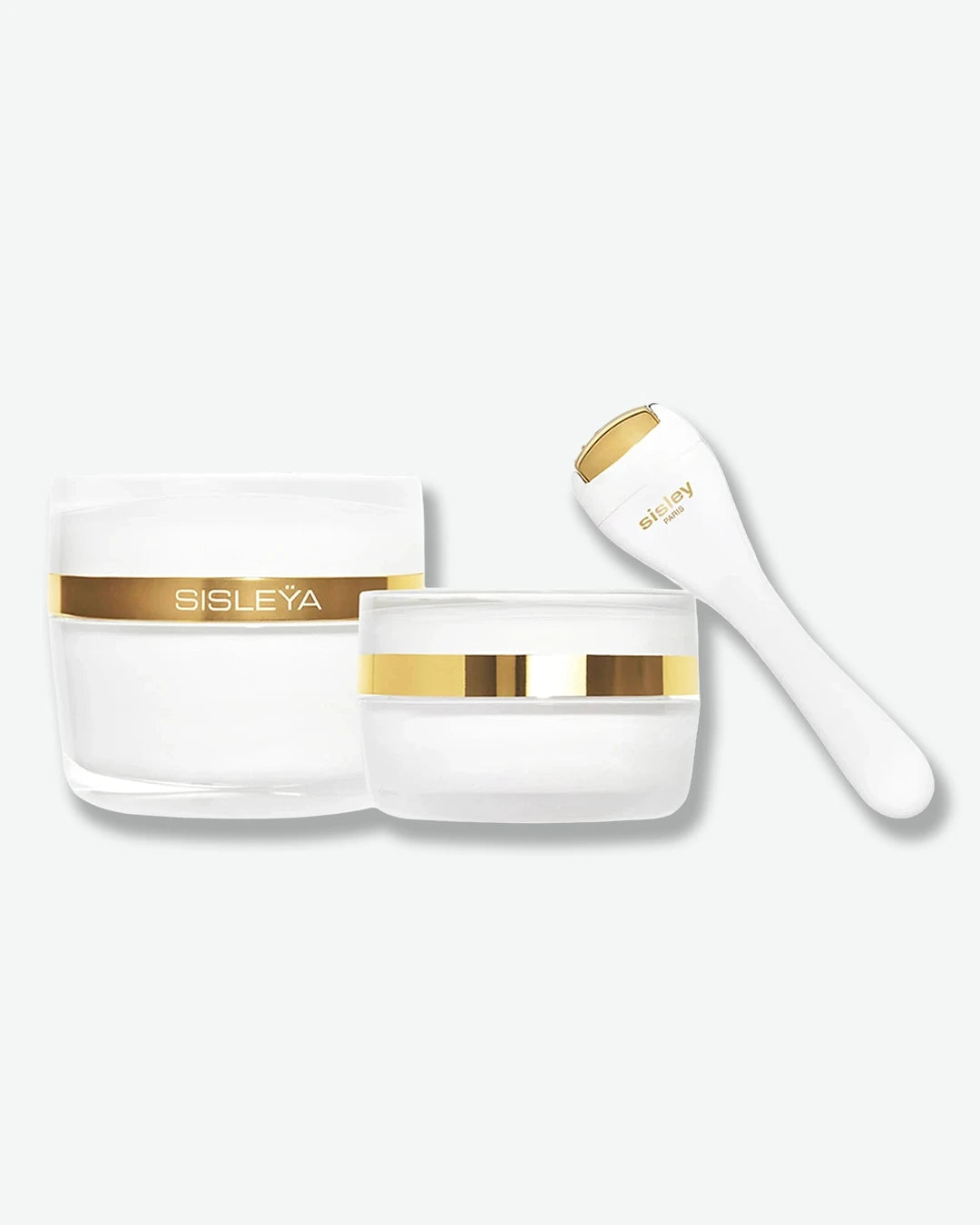 Sisleÿa L'Intégral Anti-Âge Duo set with a full-size face cream, eye cream, and gold massage roller tool on a white background.