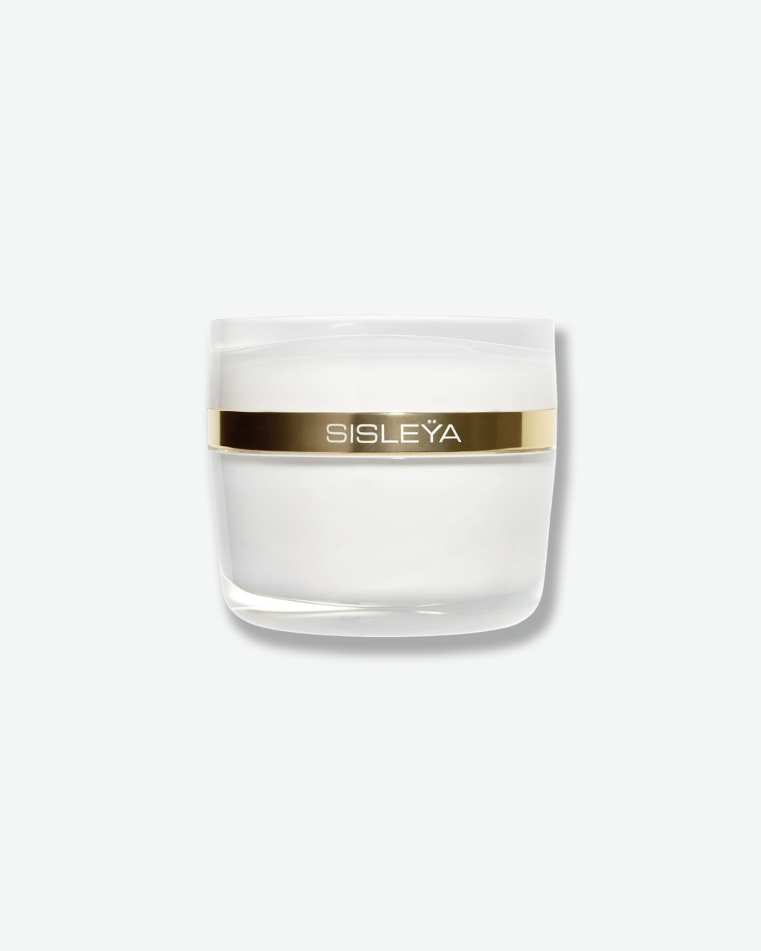 Front view of a Sisleÿa anti-aging face cream jar by Sisley Paris against a plain gray background. The smooth, opaque white porcelain-glass jar is encircled around the upper half by a distinct, wide band of reflective metallic gold featuring the brand name "SISLEYÄ" in white block letters.