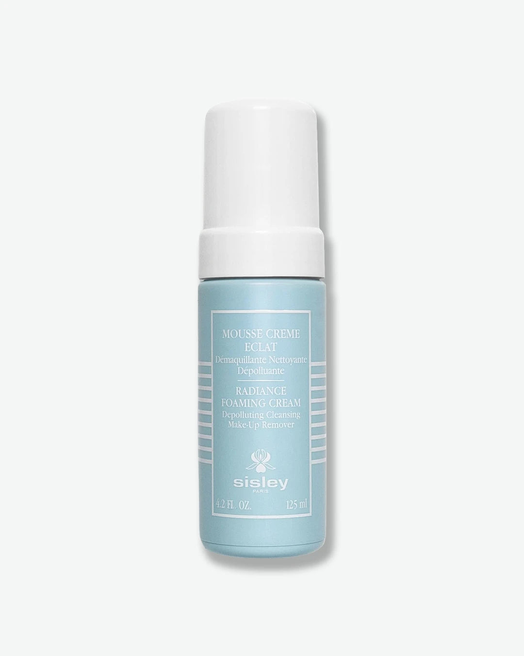 A matte, light pastel blue bottle of Sisley Paris Radiance Foaming Cream cleanser, shown standing vertically with its smooth white protective cap on.