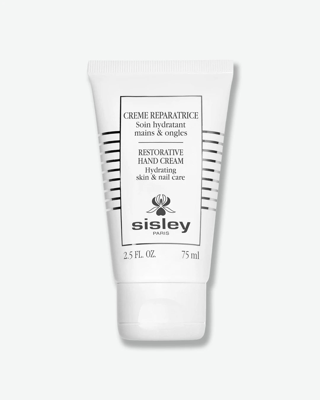 A white squeeze tube of Sisley Paris Restorative Hand Cream (Crème Réparatrice) for skin and nail care, resting vertically on its matching white flip-top cap.