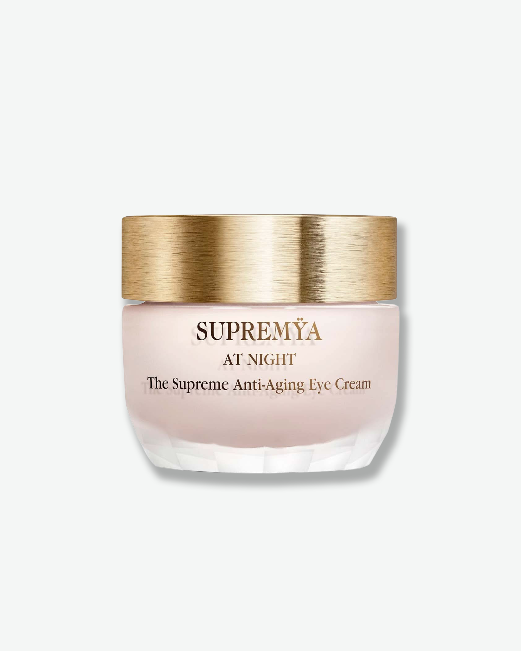 Supremáya anti-aging eye cream jar with gold lid on a white background