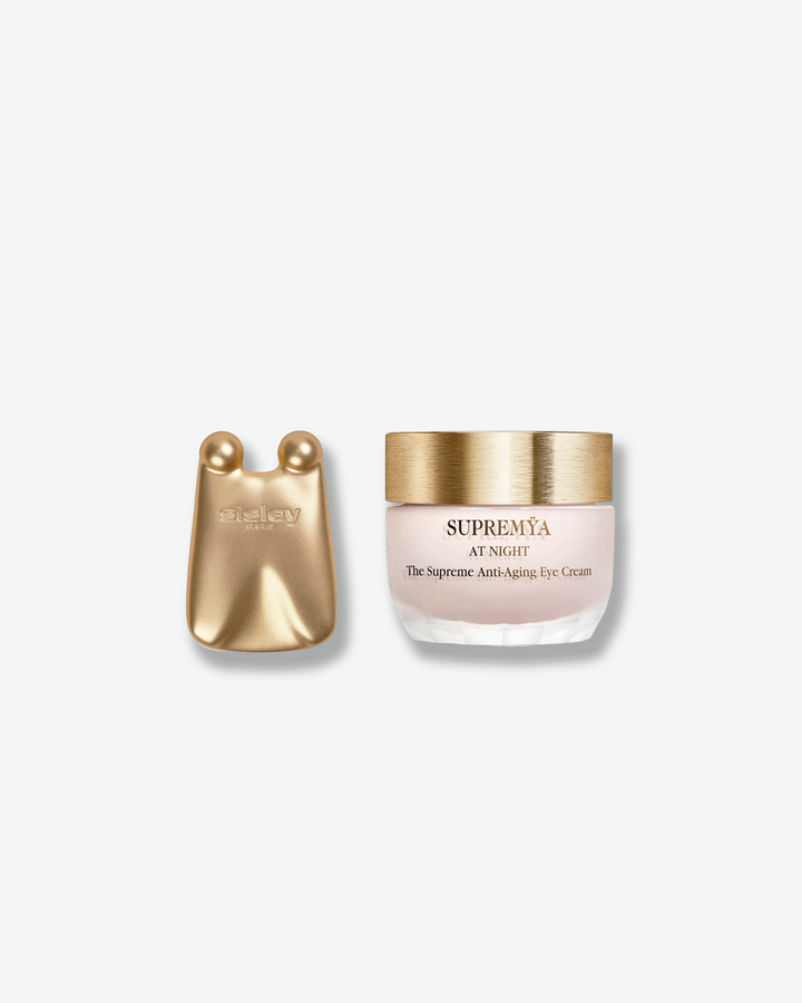 Supremya eye cream jar and applicator on a white background