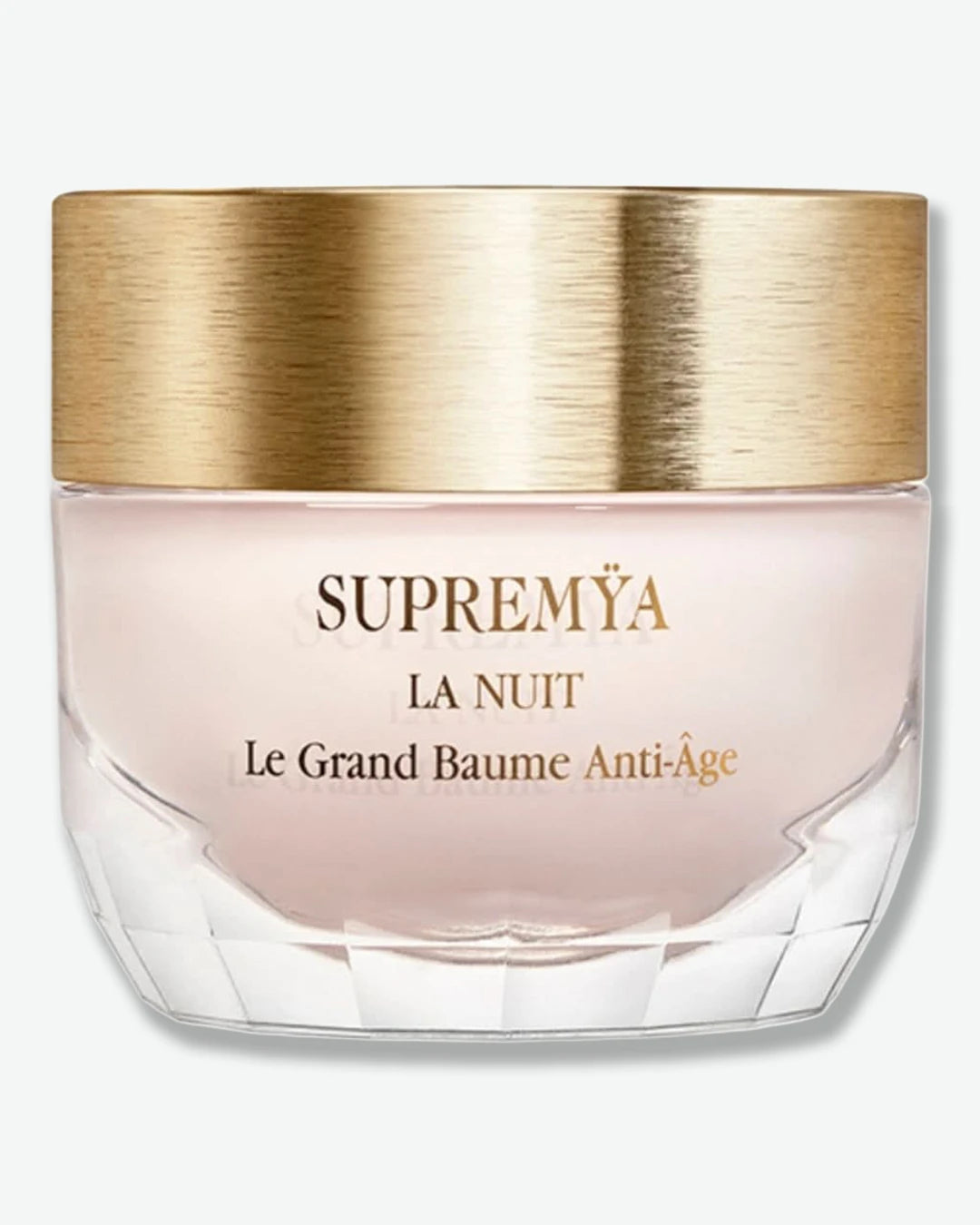 Sisley Paris Supremÿa La Nuit cream jar with a brushed-gold lid, on a light grey background