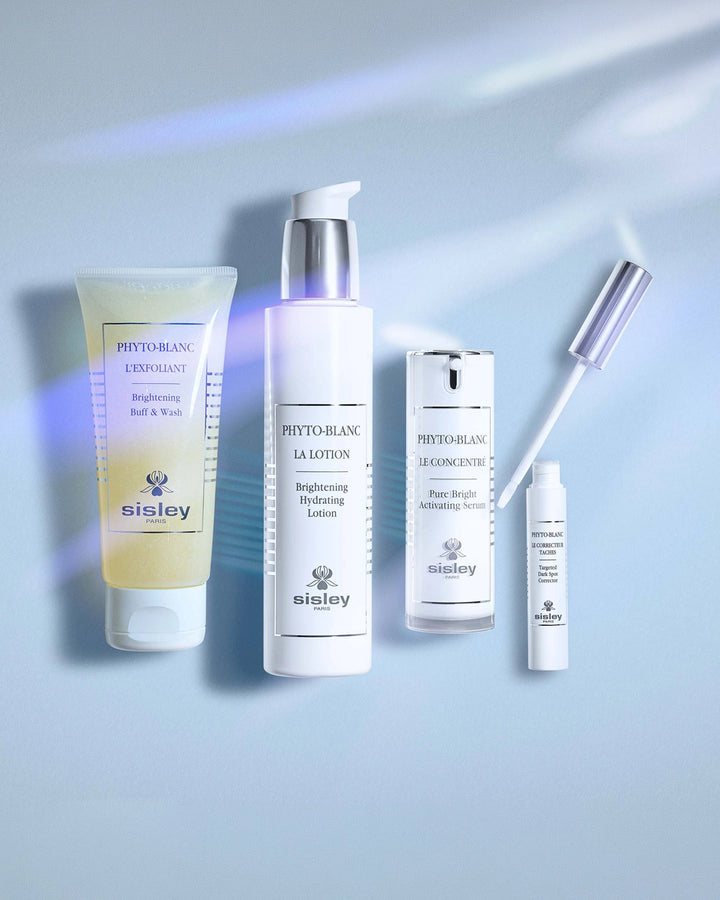 Sisley skincare products on a light blue background