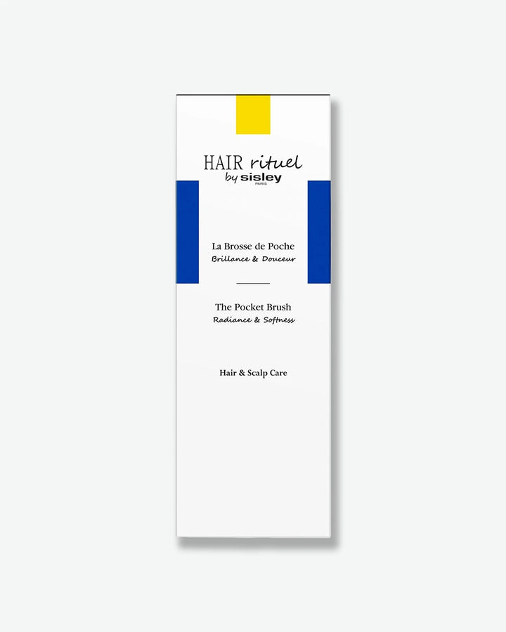 Hairbrush packaging with 'Hair rituel by Sisley The Pocket Brush' branding on a white background