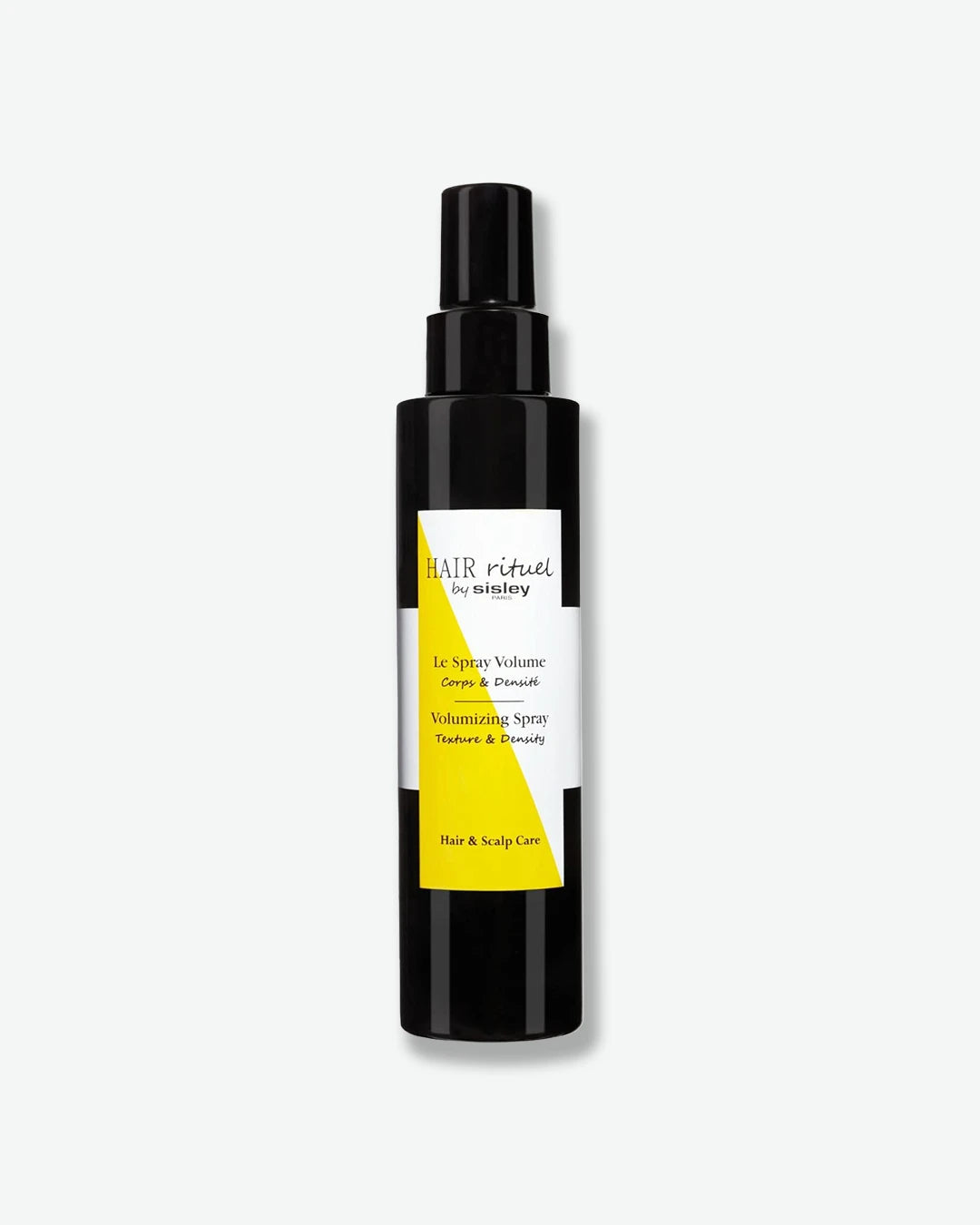 A bottle of HAIR Rituel by Sisley Le Spray Volume, featuring a glossy black spray bottle with a modern white and vibrant yellow geometric label.