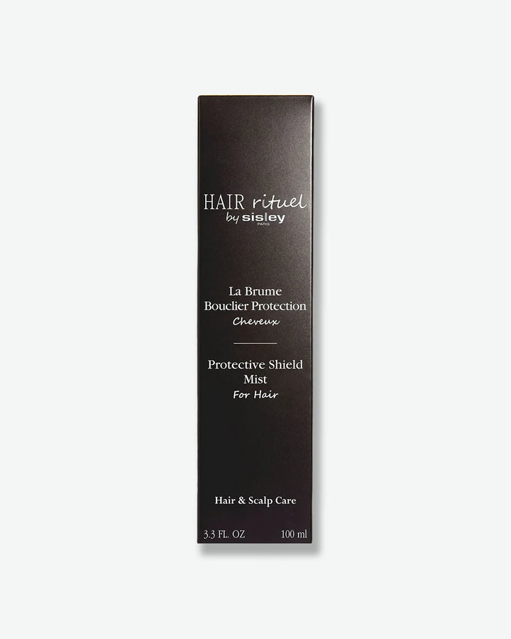 Sisley Hair Rituel Protective Shield Mist for Hair in black rectangular packaging, featuring white text with the Hair Rituel by Sisley Paris logo, product name, hair and scalp care designation, and 100 mL (3.3 fl. oz.) size.