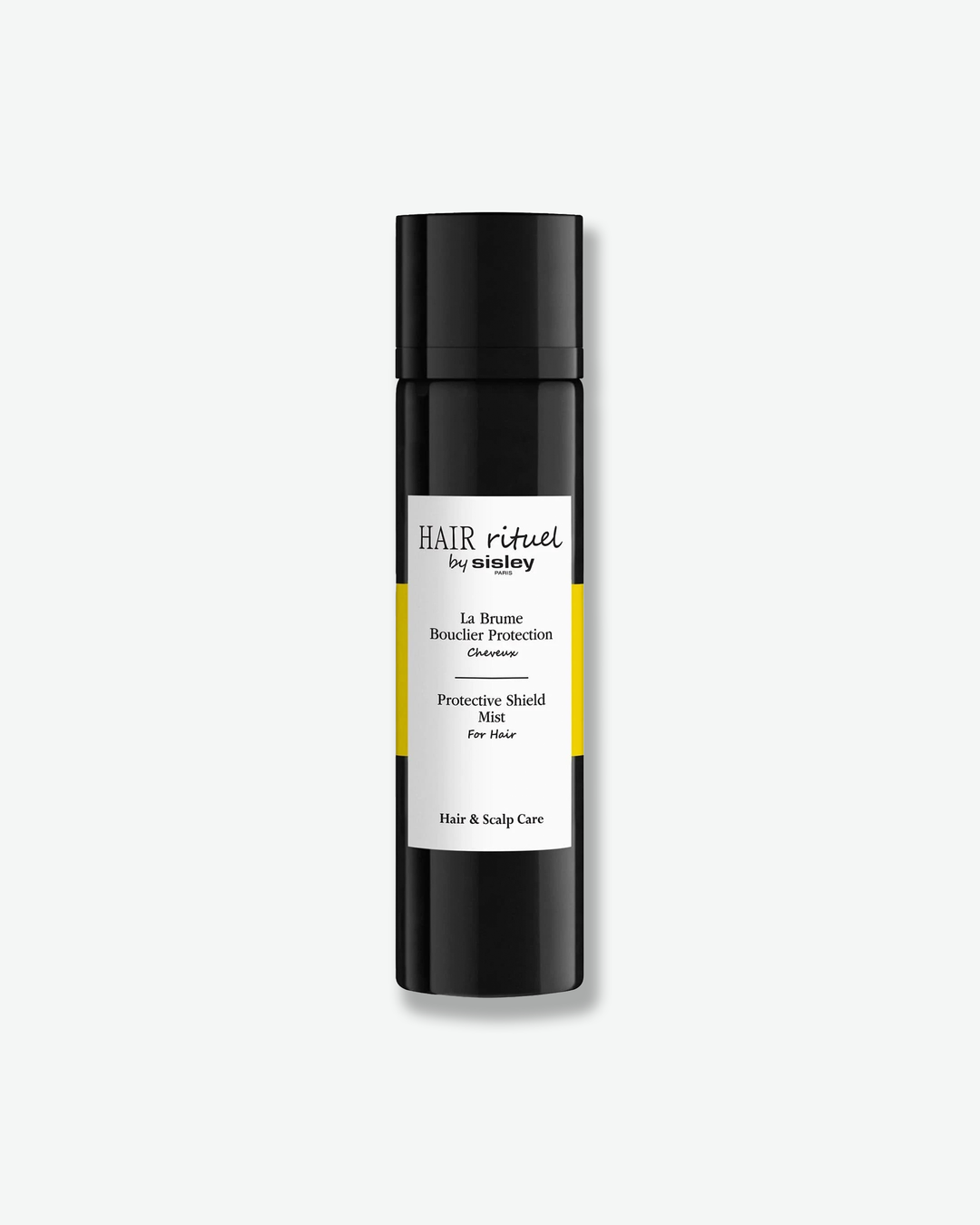 Hair care product bottle with black cap and white label on a white background