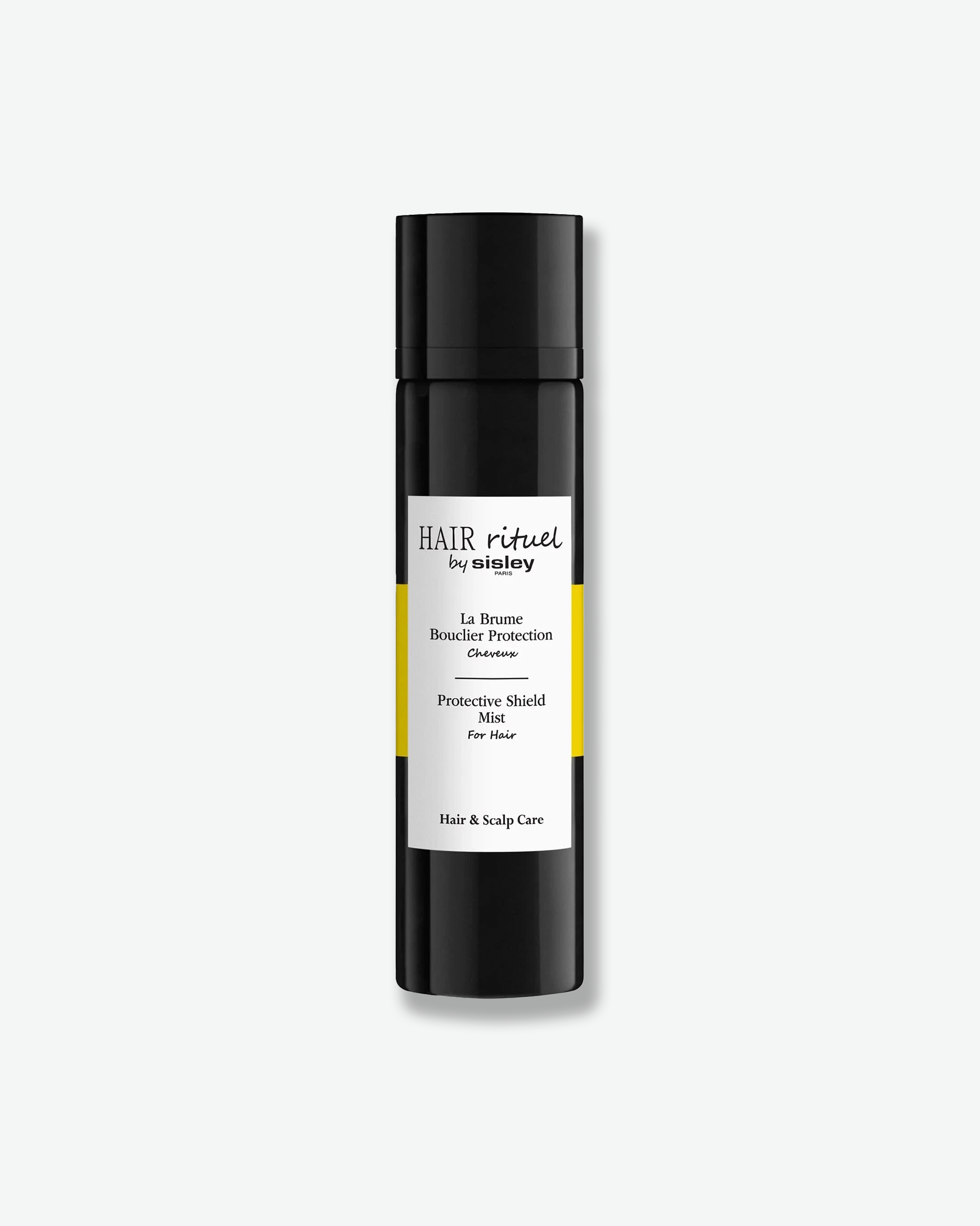 Hair care product bottle with black cap and white label on a white background