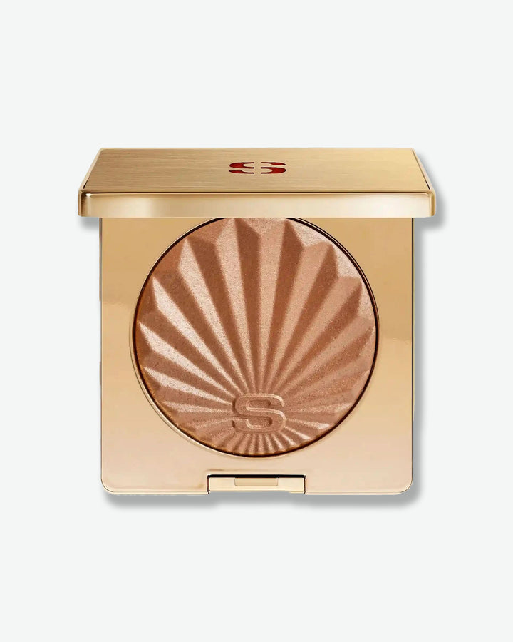 Bronzing powder compact with brand logo on a white background