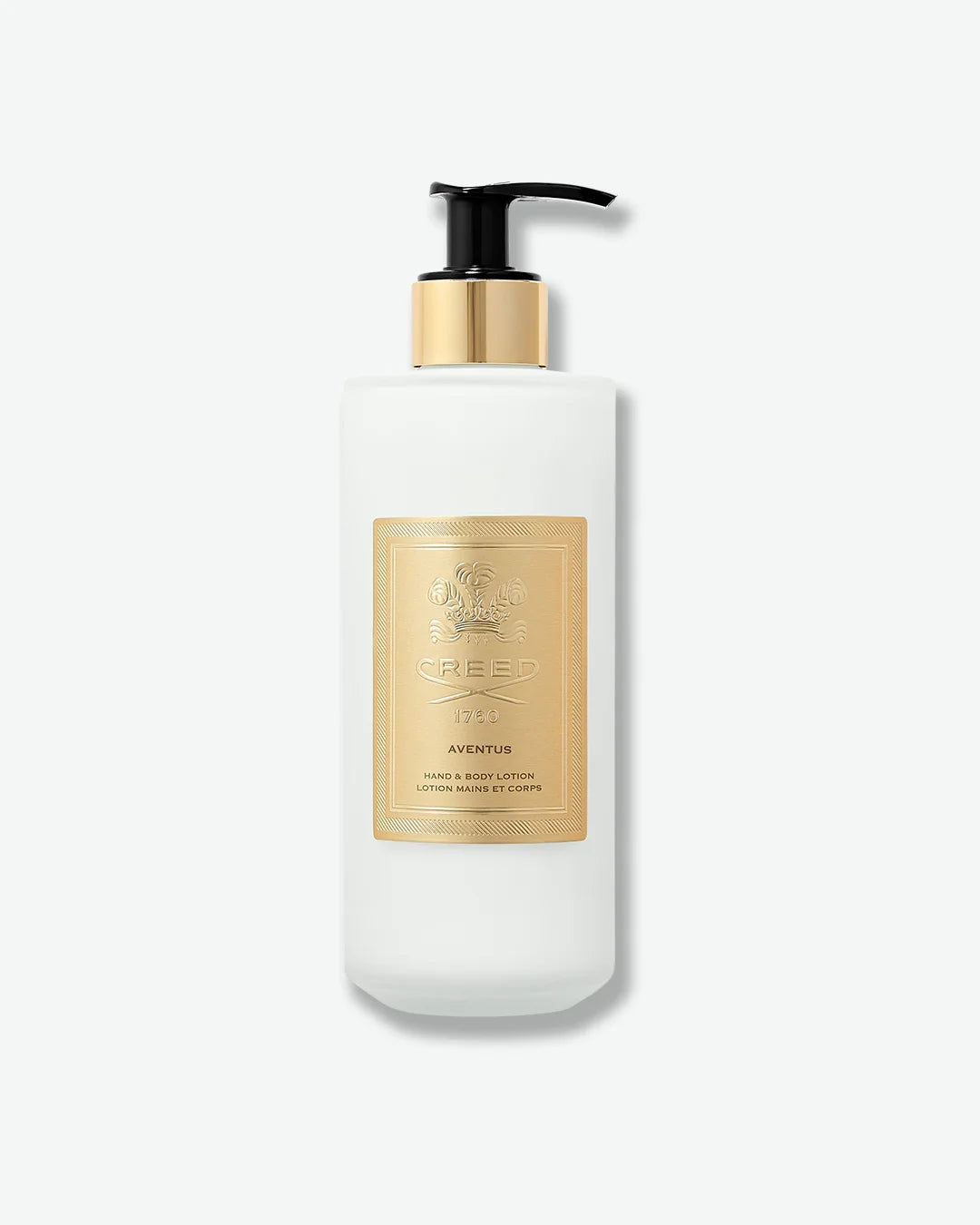 White Creed Aventus Hand & Body lotion bottle with black pump and gold label on a white background